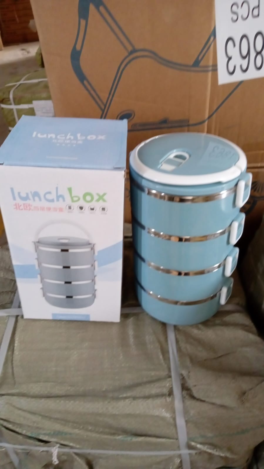 Stainless steel lunch box with four layers for hot food. Stainless steel lunch box with four layers for hot food.